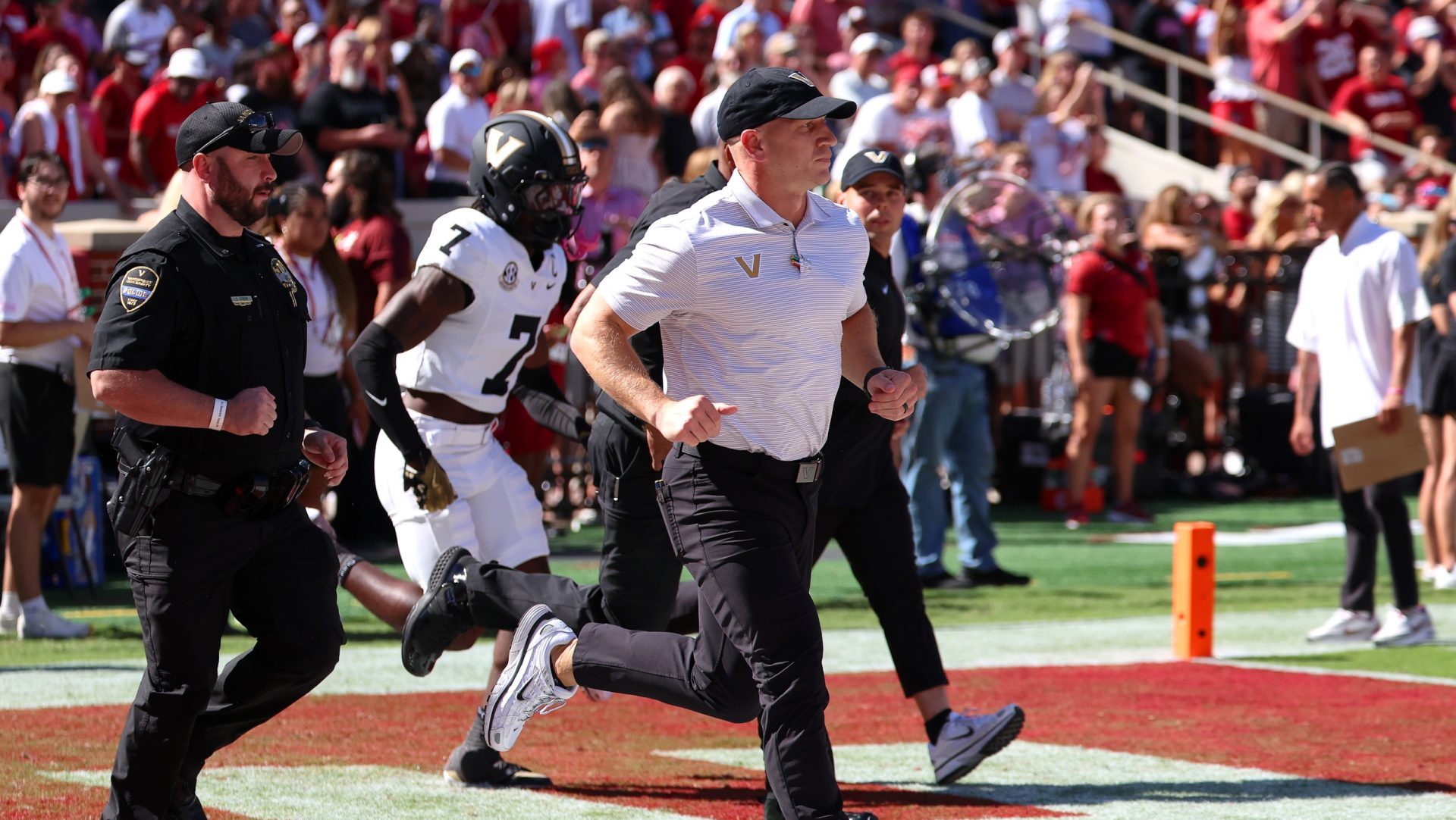 Oct 4, 2025; Tuscaloosa, Alabama, USA; Vanderbilt Commodores head coach Clark Lea takes the field before a game against the Alabama Crimson Tide at Saban Field at Bryant-Denny Stadium.
