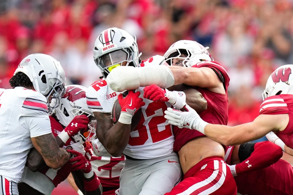 Ohio State Buckeyes running back Isaiah West (32) runs the ball in the second half at Camp Randall Stadium on Saturday, Oct. 18, 2025 in Madison, Wisconsin