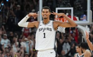 Oct 26, 2025; San Antonio, Texas, USA; San Antonio Spurs forward Victor Wembanyama (1) celebrates a three-point shot in the second half against the Brooklyn Nets at Frost Bank Center.