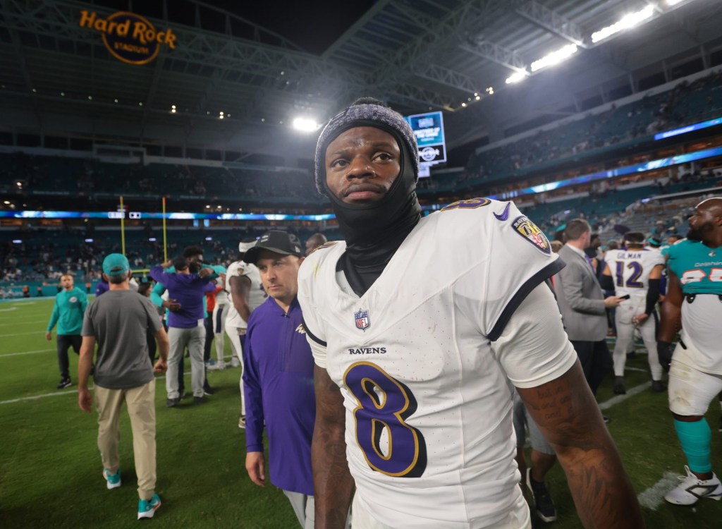Oct 30, 2025; Miami Gardens, Florida, USA; Baltimore Ravens quarterback Lamar Jackson (8) walks off the field after a win over Miami Dolphins at Hard Rock Stadium.