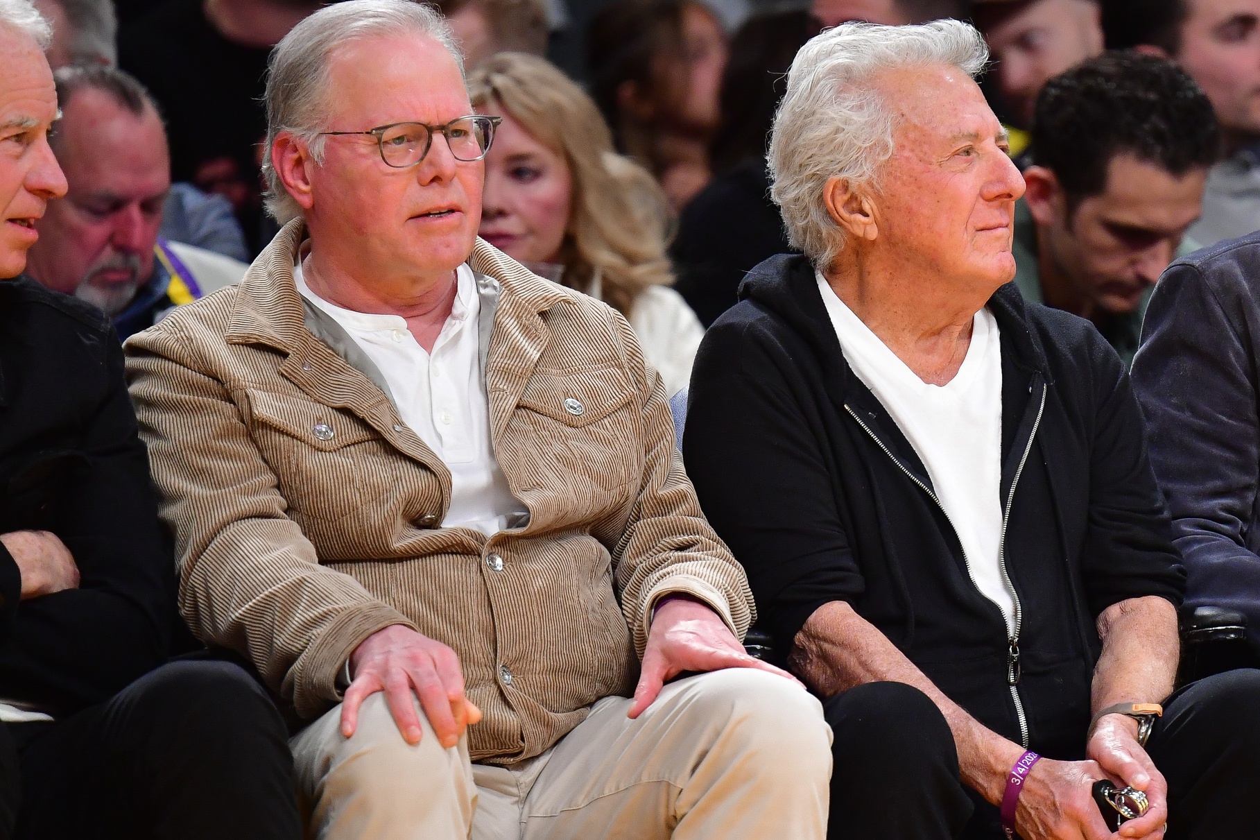 Mar 4, 2024; Los Angeles, California, USA; Warner Bros. Discovery chief executive David Zaslav and actor Dustin Hoffman attend the game between the Los Angeles Lakers and Oklahoma City Thunder at Crypto.com Arena.