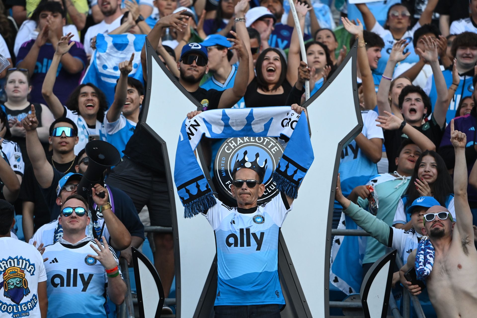May 11, 2024; Charlotte, North Carolina, USA; ESPN commentator Paul Finebaum is crowned before the match at Bank of America Stadium.