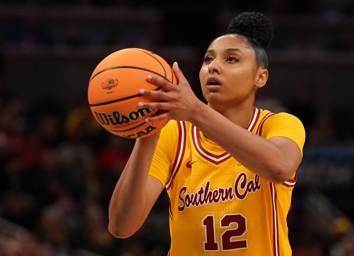 Mar 8, 2025; Indianapolis, IN, USA; South California Trojans guard JuJu Watkins (12) attempts a free throw against Michigan Wolverines during the second half of the Big Ten Conference Tournament semifinals at Gainbridge Fieldhouse.
