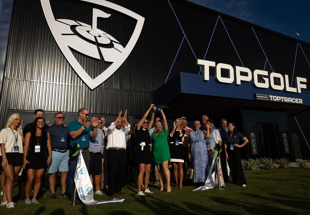 TopGolf representatives celebrate their ribbon-cutting ceremony with Bay County residents in Panama City Beach, Fla., June 26, 2025. (