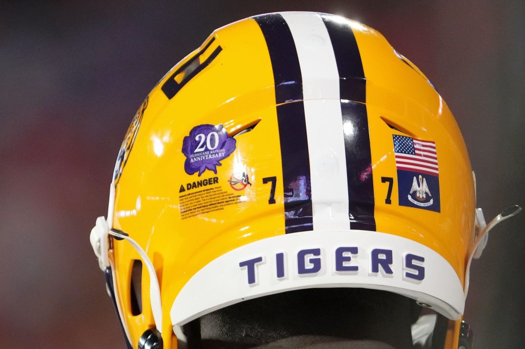 Aug 30, 2025; Clemson, South Carolina, USA; A detail view of a helmet worn by LSU Tigers offensive tackle Ory Williams (77) with a sticker on it to commemorate the 20th anniversary of hurricane Katrina during the first quarter at Memorial Stadium