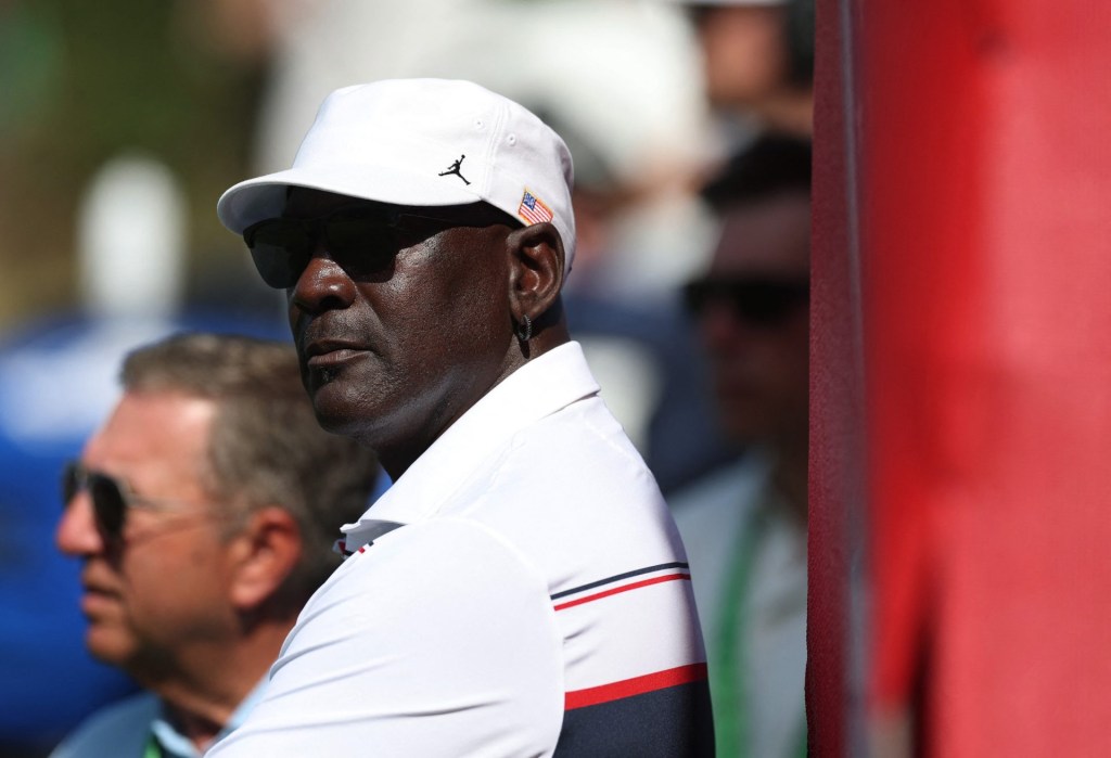 [US, Mexico & Canada customers only] Sep 26, 2025; Bethpage, New York, USA; Former basketball player Michael Jordan watches during the four-balls on the first day of competition for the Ryder Cup at Bethpage Black.