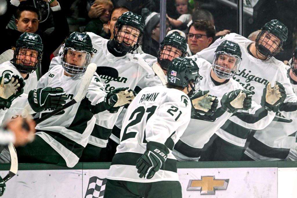 Michigan State's Anthony Romani celebrates his goal with teammates during the first period in the game against New Hampshire on Thursday, Oct. 9, 2025, at Munn Ice Arena in East Lansing.