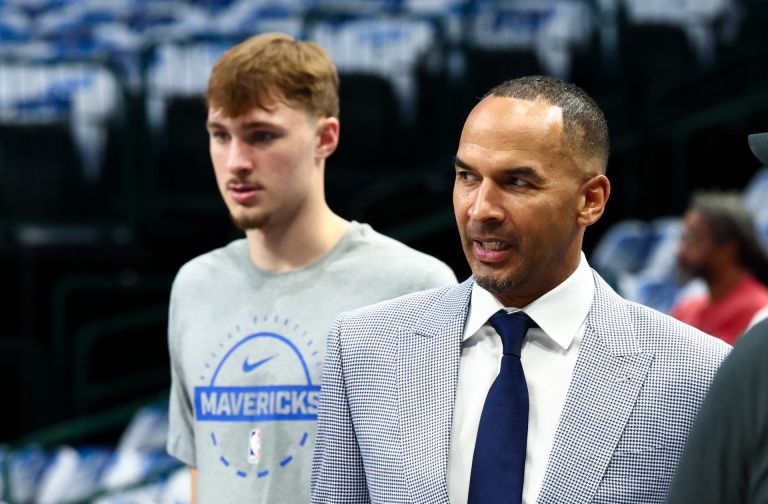 Oct 22, 2025; Dallas, Texas, USA; Dallas Mavericks general manager Nico Harrison and Dallas Mavericks forward Cooper Flagg (32) before the game against the San Antonio Spurs at American Airlines Center