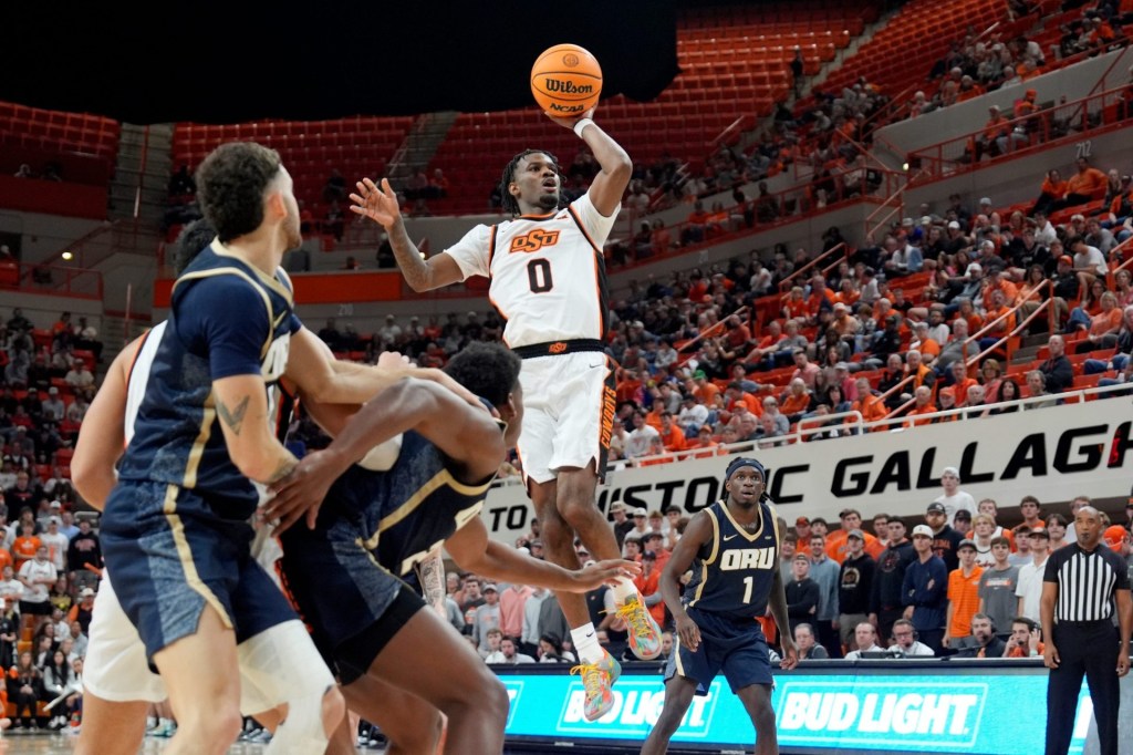 Oklahoma State Cowboys guard Jaylen Curry (0) puts up a shot during an NCAA basketball game between the Oklahoma State University Cowboys (OSU) and Oral Roberts at Gallagher-Iba Arena in Stillwater, Okla., Tuesday, Nov. 4, 2025. Oklahoma State on 95-71.
