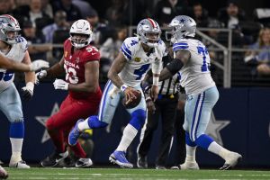 Nov 3, 2025; Arlington, Texas, USA; Dallas Cowboys quarterback Dak Prescott (4) runs with the ball during the game between the Dallas Cowboys and the Arizona Cardinals at AT&T Stadium. Mandatory Credit: