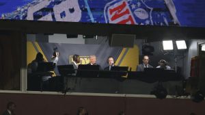 Nov 9, 2025; Landover, Maryland, USA; President Donald Trump is interviewed by Fox play-by-play announcer Kenny Albert and analyst Jonathan Vilma during the third quarter of a game between the Washington Commanders and the Detroit Lions at Northwest Stadium