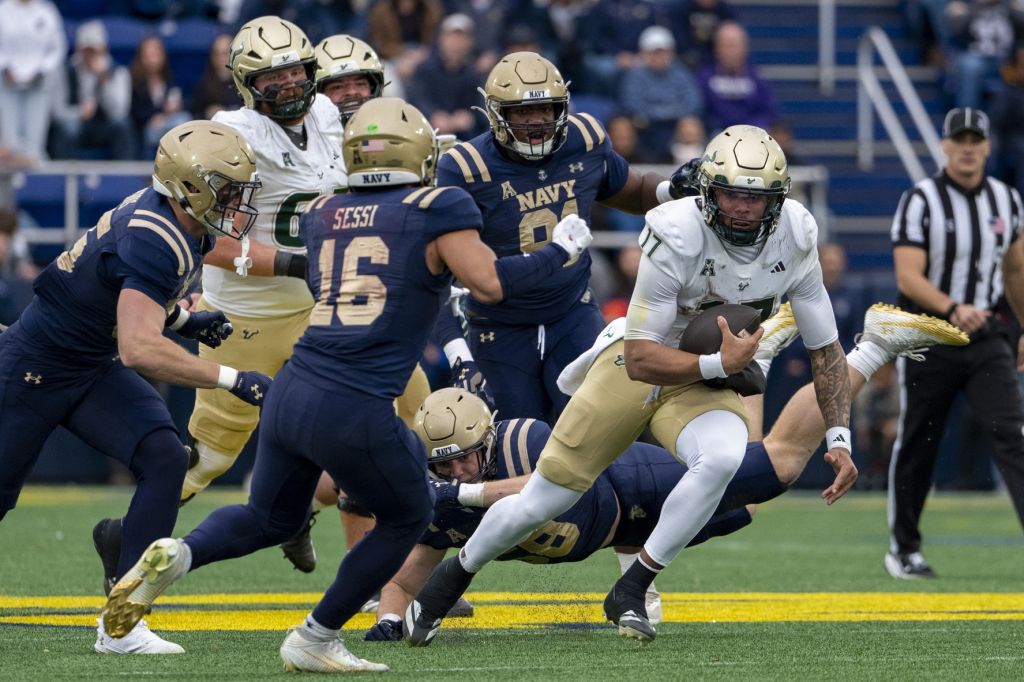 Nov 15, 2025; Annapolis, Maryland, USA; South Florida Bulls quarterback Byrum Brown (17) scrambles through the Navy Midshipmen defense during the second half at Navy-Marine Corps Memorial Stadium. Navy Midshipmen defeated South Florida Bulls 41-28.