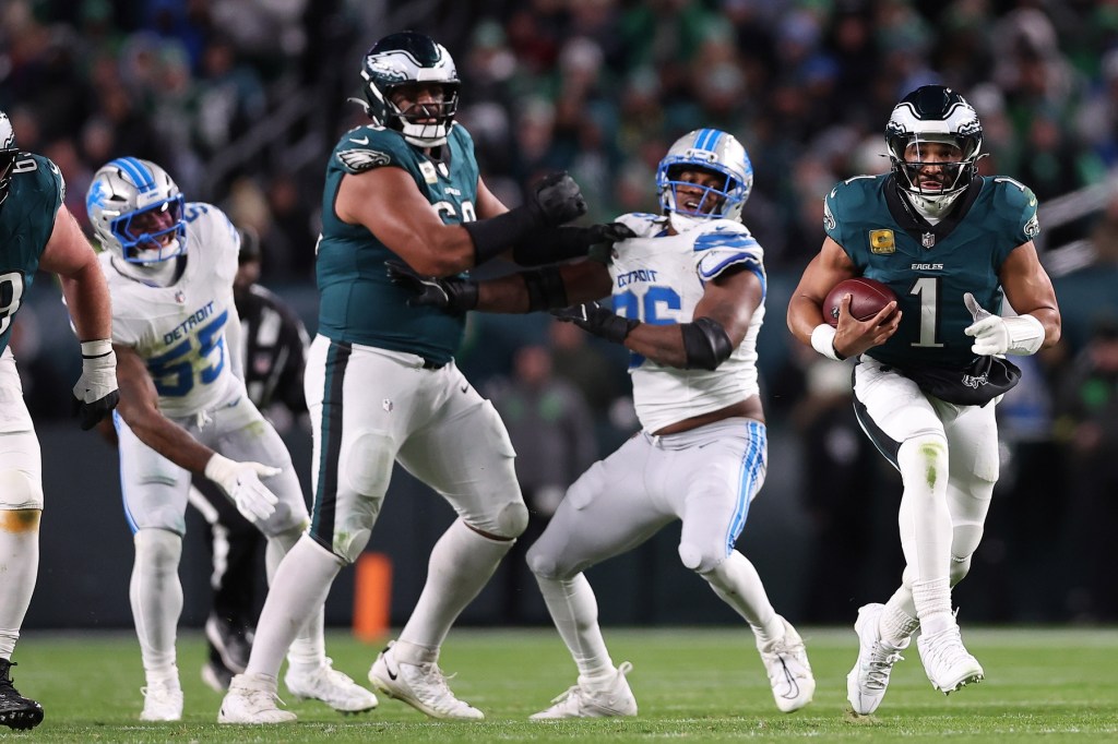Nov 16, 2025; Philadelphia, Pennsylvania, USA; Philadelphia Eagles quarterback Jalen Hurts (1) rushes the ball against the Detroit Lions during the second half at Lincoln Financial Field.