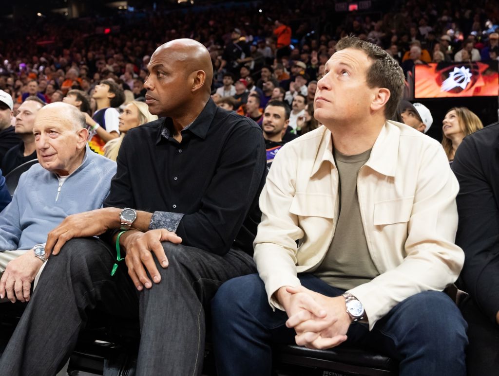 Nov 21, 2025; Phoenix, Arizona, USA; Phoenix Suns former player Charles Barkley (left) and team owner Mat Ishbia sit courtside against the Minnesota Timberwolves during an NBA Cup game at Mortgage Matchup Center.