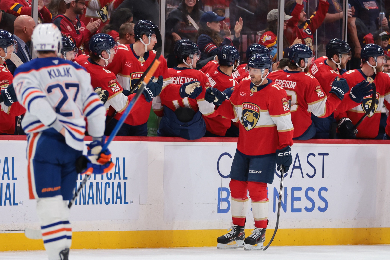 Nov 22, 2025; Sunrise, Florida, USA; Florida Panthers center Sam Reinhart (13) celebrates with teammates after scoring against the Edmonton Oilers during the second period at Amerant Bank Arena.