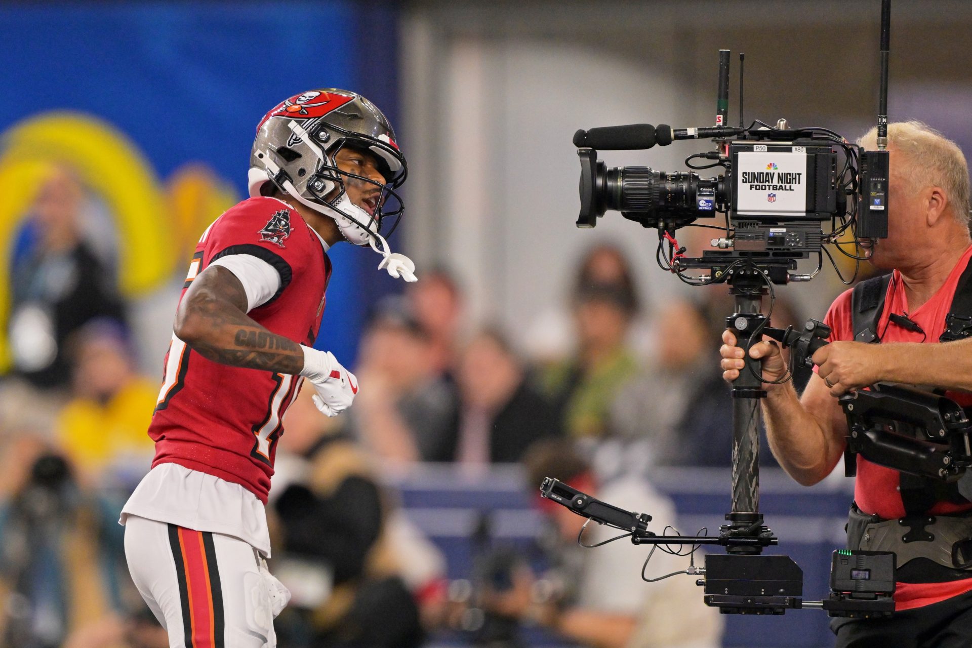 Nov 23, 2025; Inglewood, California, USA; Tampa Bay Buccaneers wide receiver Tez Johnson (15) poses for a television camera after scoring a touchdown against the Los Angeles Rams during the second quarter at SoFi Stadium.