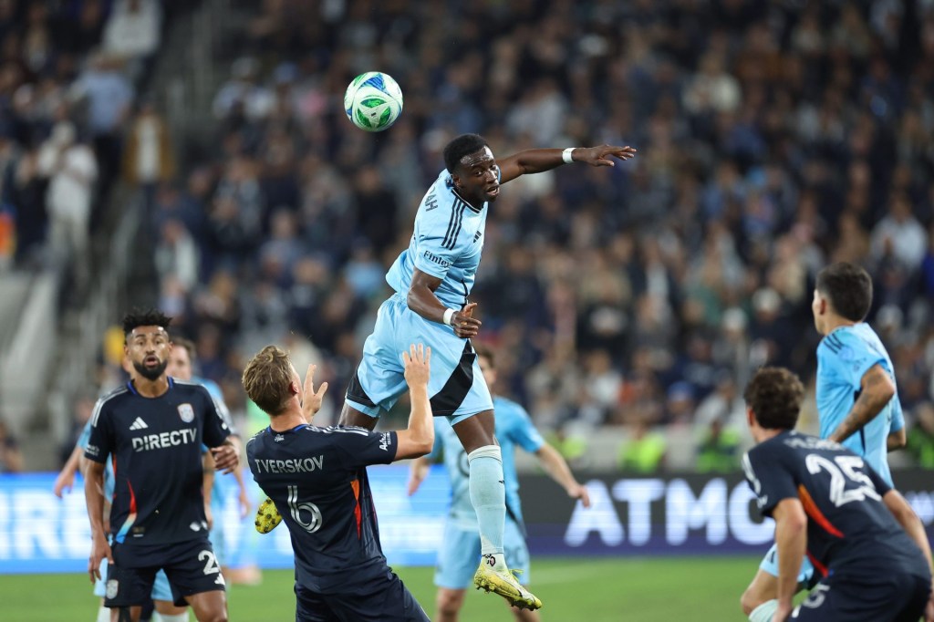 Nov 24, 2025; San Diego, California, USA; Minnesota United forward Kelvin Yeboah (9) heads the ball against San Diego FC defender Jeppe Tverskov (6) during the first half at Snapdragon Stadium.