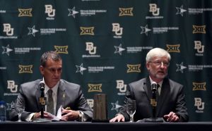 Jul 18, 2016; Dallas, TX, USA; Baylor Bears interim president David E. Garland (right) and new athletic director Mack Rhoades (left) speak at a press conference during the Big 12 Media Days at Omni Dallas Hotel.