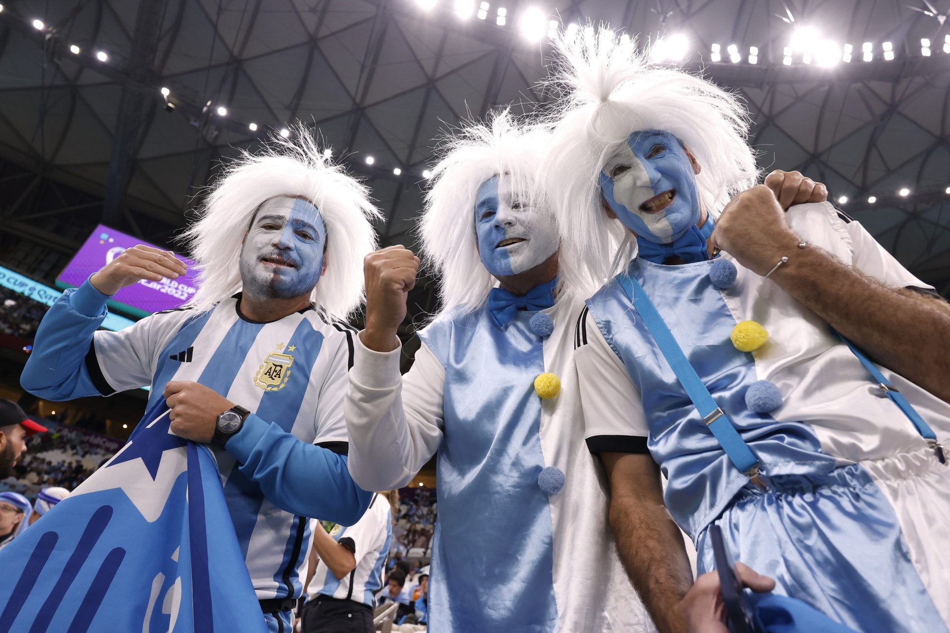 Dec 13, 2022; Lusail, Qatar; Argentina fans pose for a photograph before the semifinal match against Croatia during the 2022 World Cup at Lusail Stadium.