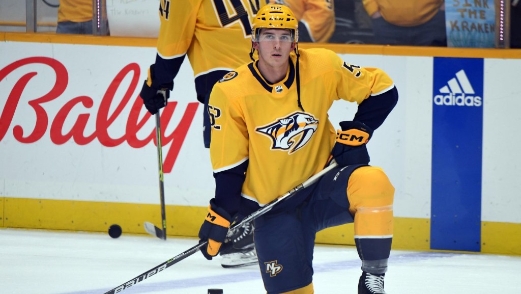 Mar 25, 2023; Nashville, Tennessee, USA; Nashville Predators defenseman Cal Foote (52) stretches before the game against the Seattle Kraken at Bridgestone Arena.