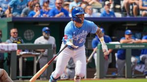 Sep 21, 2025; Kansas City, Missouri, USA; Kansas City Royals catcher Carter Jensen (22) hits a two run single against the Toronto Blue Jays during the fourth inning at Kauffman Stadium.