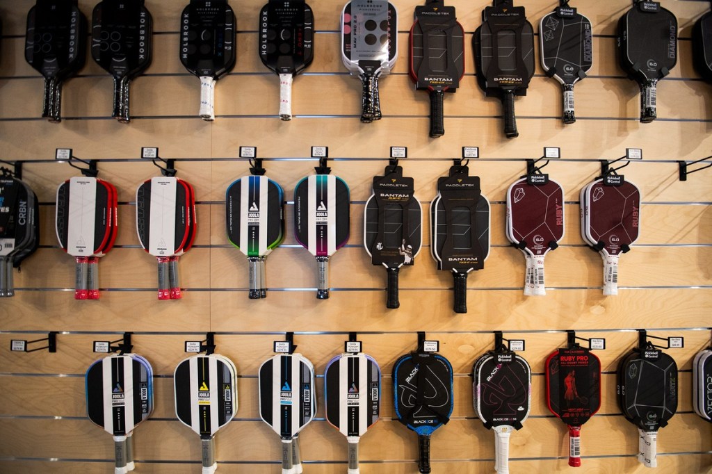A wall of pickleball paddles is photographed during a tour of The Picklr on Nov. 10, 2025. The facility, Fort Collins' first indoor pickleball complex, opened Nov. 6 in Jessup Farm Artisan Village.