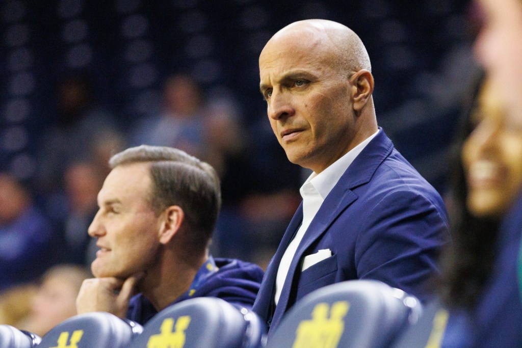 Notre Dame athletic director Pete Bevacqua, right, looks on during a NCAA men's basketball game against Bellarmine at Purcell Pavilion on Wednesday, Nov. 19, 2025, in South Bend.