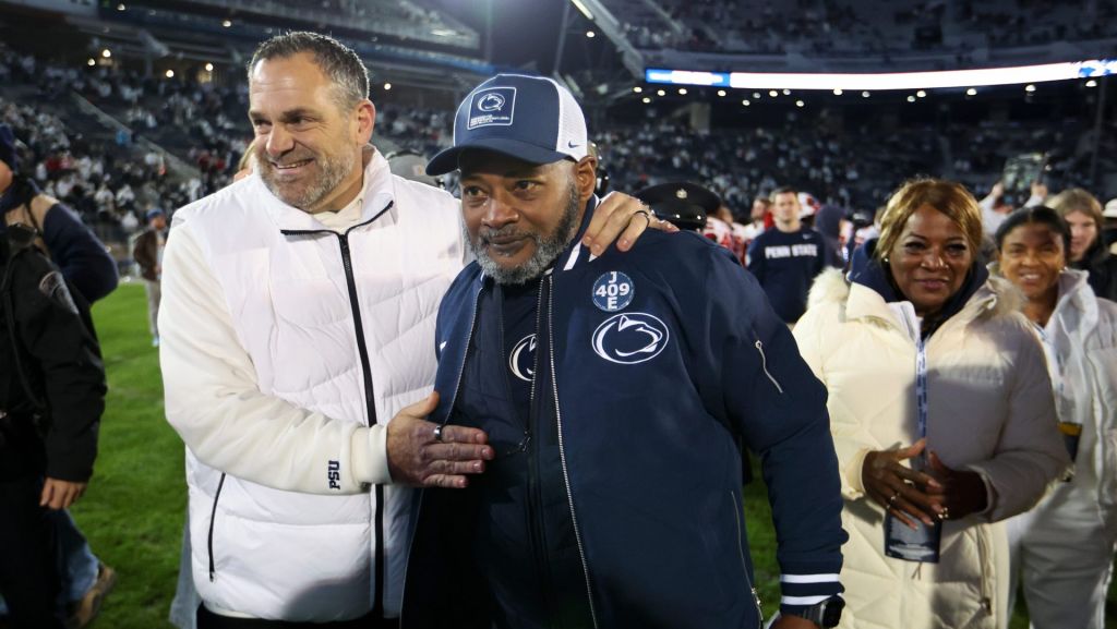 Nov 22, 2025; University Park, Pennsylvania, USA; Penn State Nittany Lions interim head coach Terry Smith is congratulated by athletic director Pat Kraft following the game against the Nebraska Cornhuskers at Beaver Stadium.