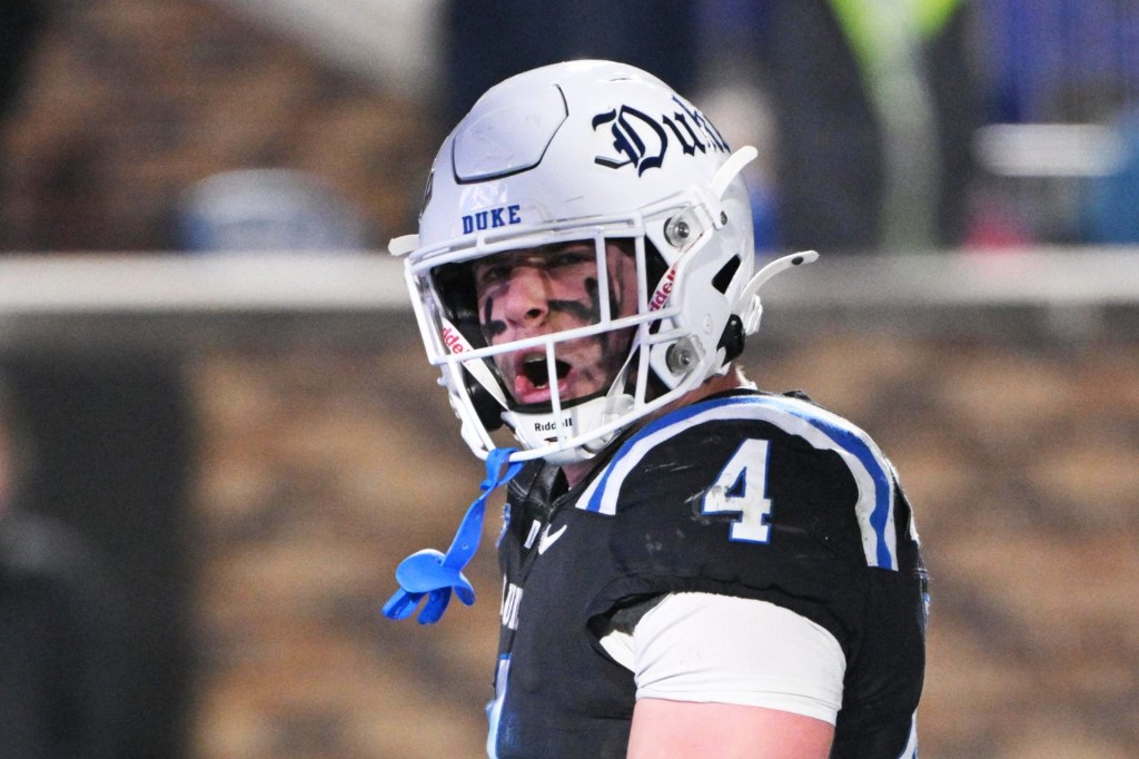 Nov 29, 2025; Durham, North Carolina, USA; Duke Blue Devils running back Anderson Castle (4) celebrates a touchdown during the third quarter against the Wake Forest Demon Deacons at Wallace Wade Stadium