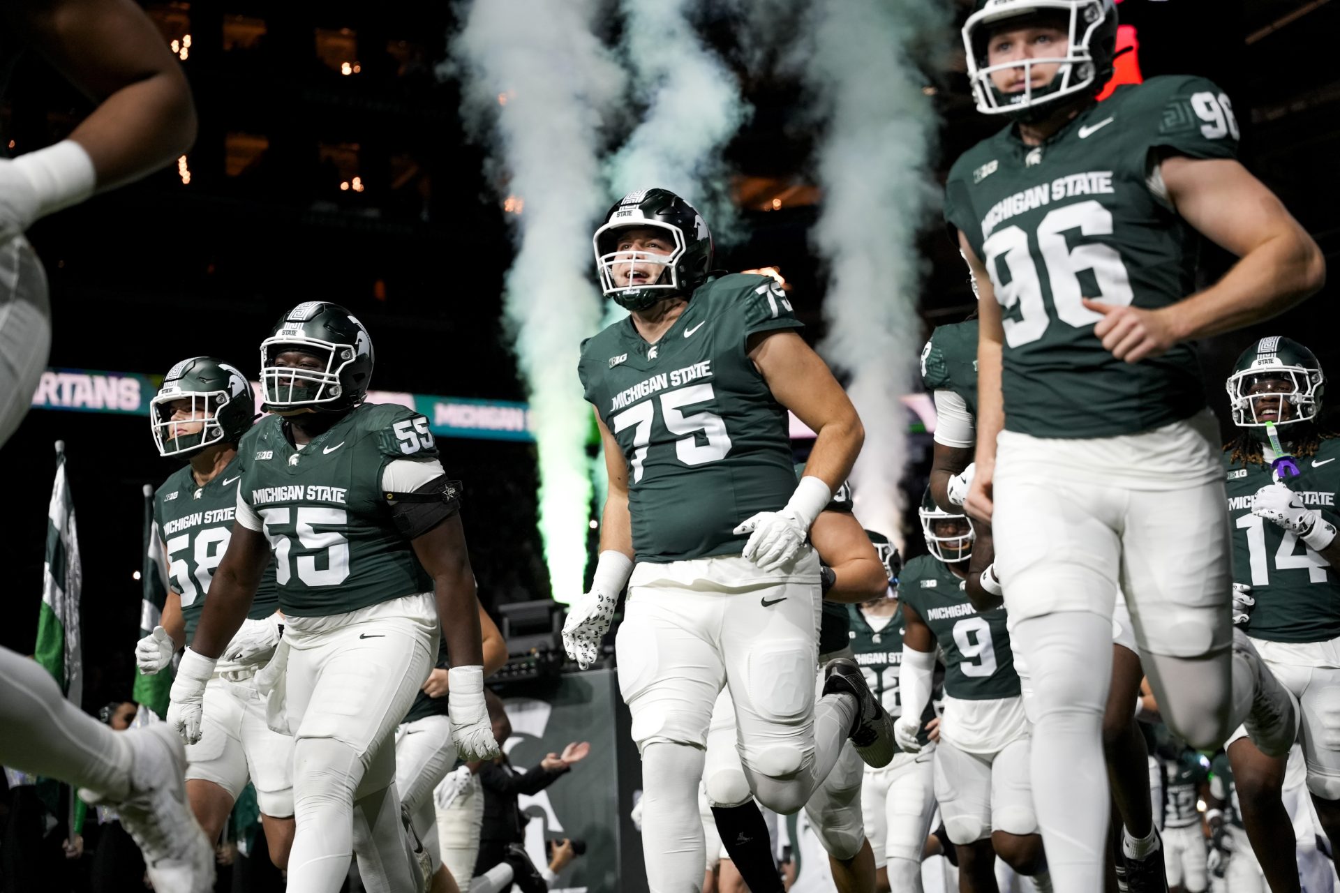 Nov 29, 2025; Detroit, Michigan, USA; Michigan State takes the field before a game against Maryland at Ford Field.