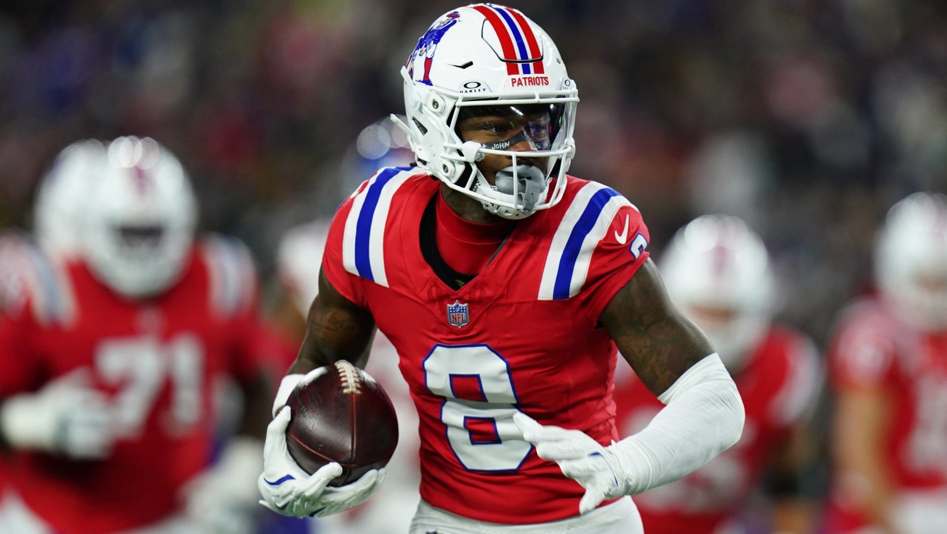 Dec 1, 2025; Foxborough, Massachusetts, USA; New England Patriots wide receiver Stefon Diggs (8) runs after a catch during the first quarter against the New York Giants at Gillette Stadium.