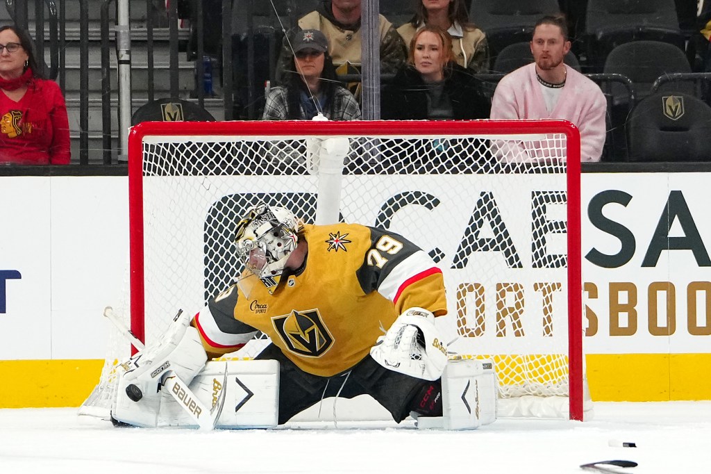 Dec 2, 2025; Las Vegas, Nevada, USA; Vegas Golden Knights goaltender Carter Hart (79) makes a save against the Chicago Blackhawks during an overtime period at T-Mobile Arena