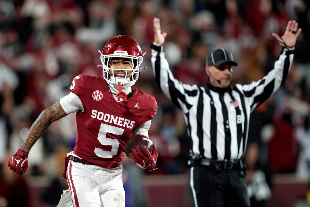 Oklahoma Sooners wide receiver Isaiah Sategna III (5) smiles as he scores a touchdown during a college football game between the University of Oklahoma Sooners (OU) and the LSU Tigers at Gaylord Family Ð Oklahoma Memorial Stadium in Norman, Okla., Saturday, Nov. 29, 2025. Oklahoma won 17-13.