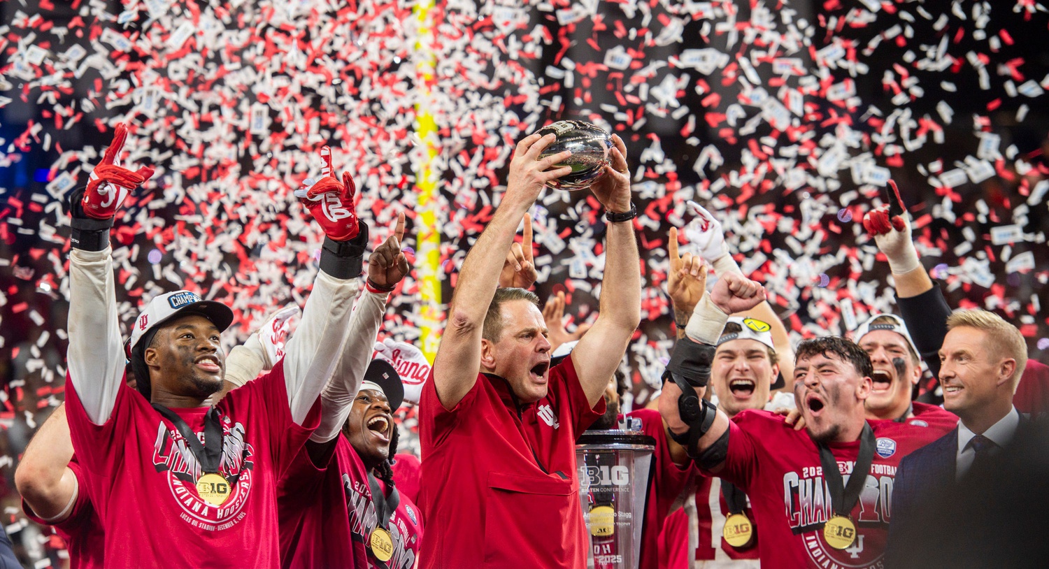 Indiana Head Coach Curt Cignetti and the Hoosiers celebrate after the Indiana versus Ohio State Big Ten Championship football game at Lucas Oil Stadium on Saturday, Dec. 6, 2025.