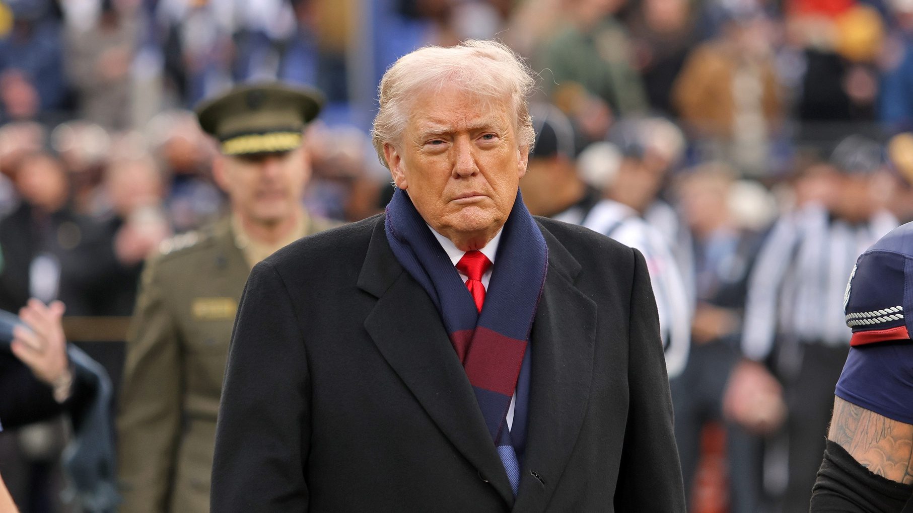 Dec 13, 2025; Baltimore, Maryland, USA; President Donald J. Trump walks on the field during the first half of the 126th Army-Navy game at M&T Bank Stadium.