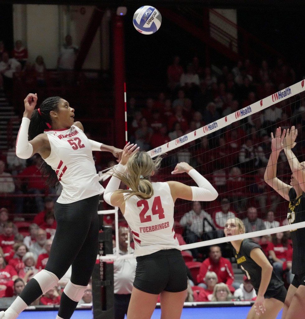 Wisconsin middle blocker Carter Booth (52) is shown during their volleyball match Tuesday, September 9, 2025, at the Wisconsin Field House in Madison, Wisconsin. Wisconsin beat UW-Milwaukee 3-0.