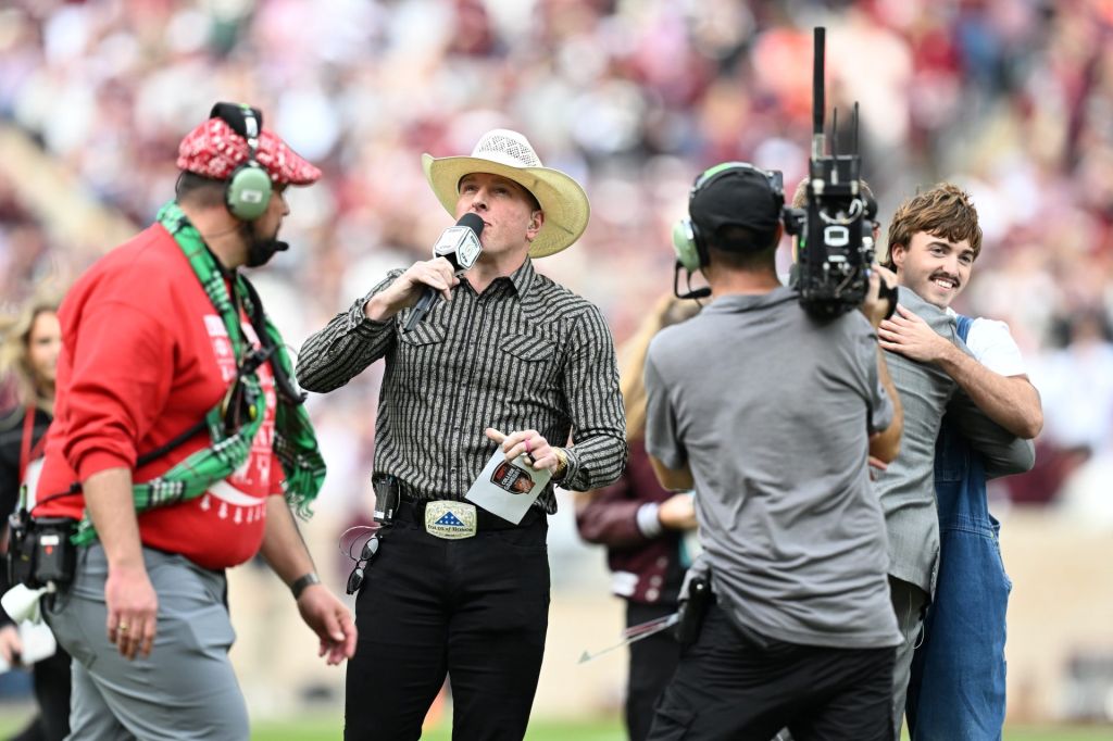 Dec 20, 2025; College Station, TX, USA; Pat McAfee reacts prior to the game between the Miami Hurricanes and the Texas A&M Aggies during the first round of the CFP National Playoff at Kyle Field.