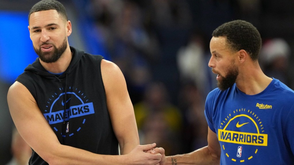 Dec 25, 2025; San Francisco, California, USA; Dallas Mavericks guard Klay Thompson (left) greets Golden State Warriors guard Stephen Curry (right) before the game at Chase Center.