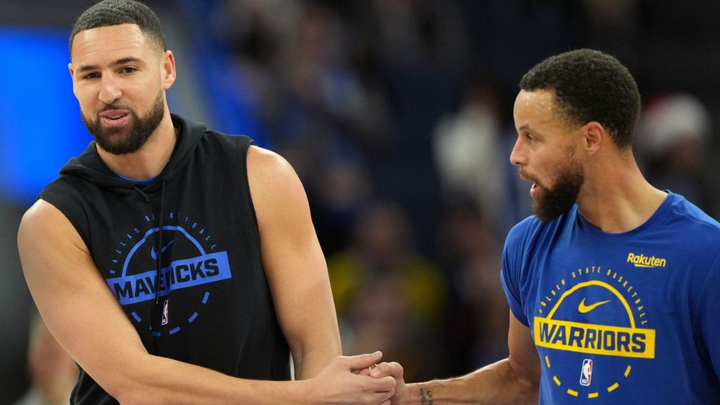 Dec 25, 2025; San Francisco, California, USA; Dallas Mavericks guard Klay Thompson (left) greets Golden State Warriors guard Stephen Curry (right) before the game at Chase Center.
