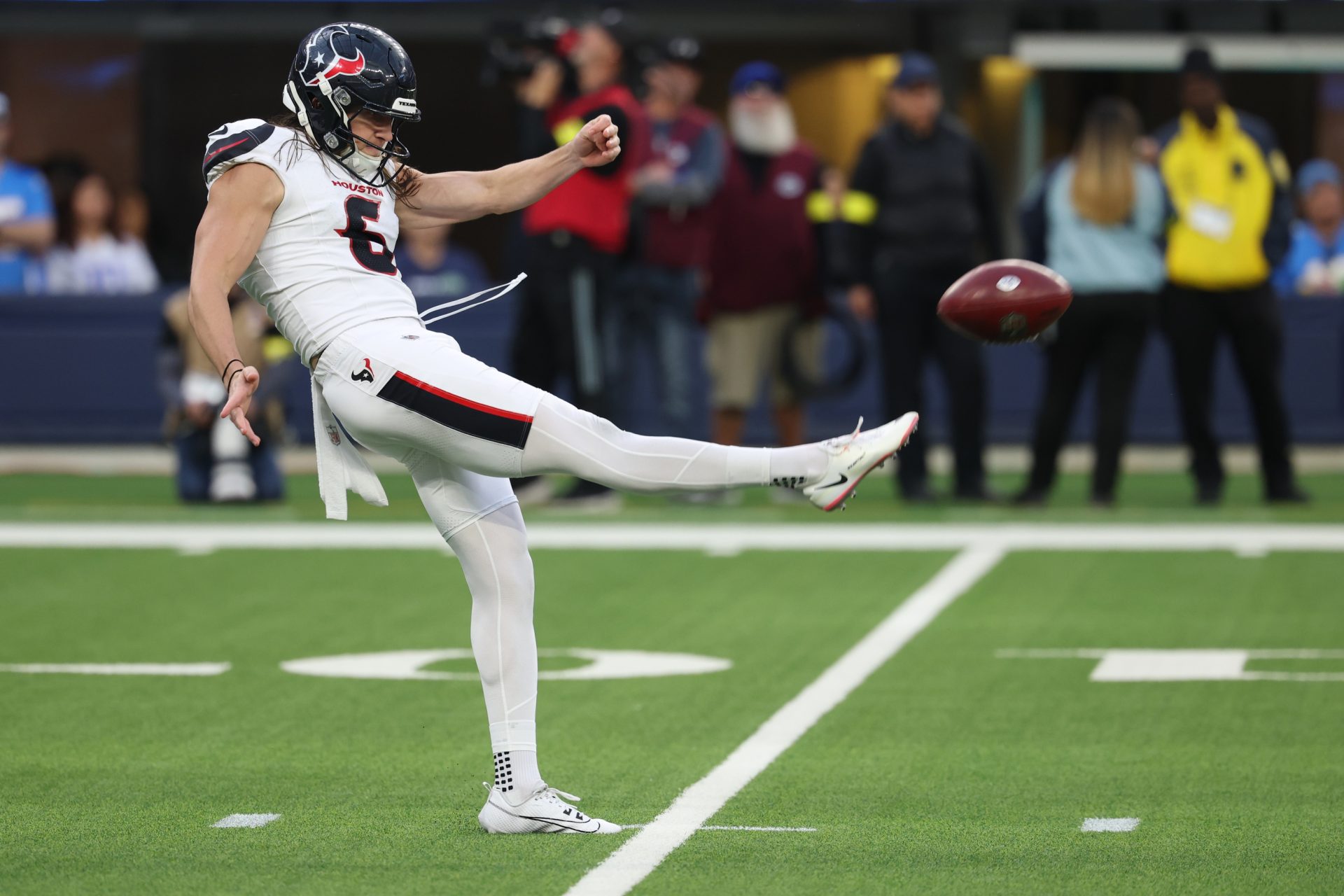 Dec 27, 2025; Inglewood, California, USA; Houston Texans punter Tommy Townsend (6) punts the ball against the Los Angeles Chargers during the second half at SoFi Stadium.