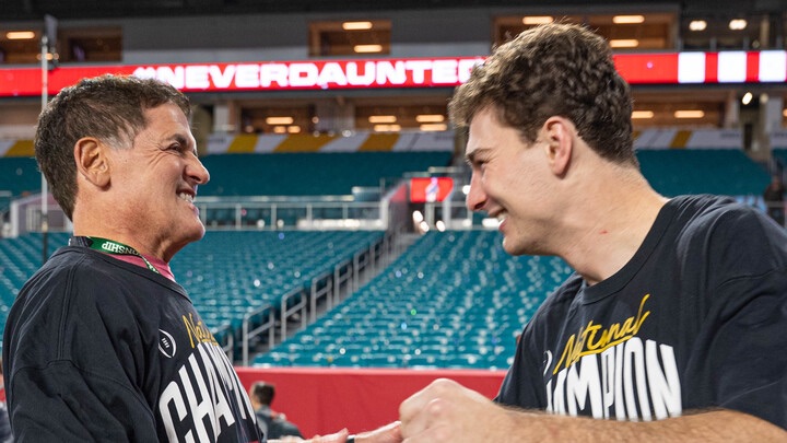 Billionaire Mark Cuban, an Indiana alum and NIL donor, with quarterback Fernando Mendoza after the Hoosiers won their first CFP national championship.