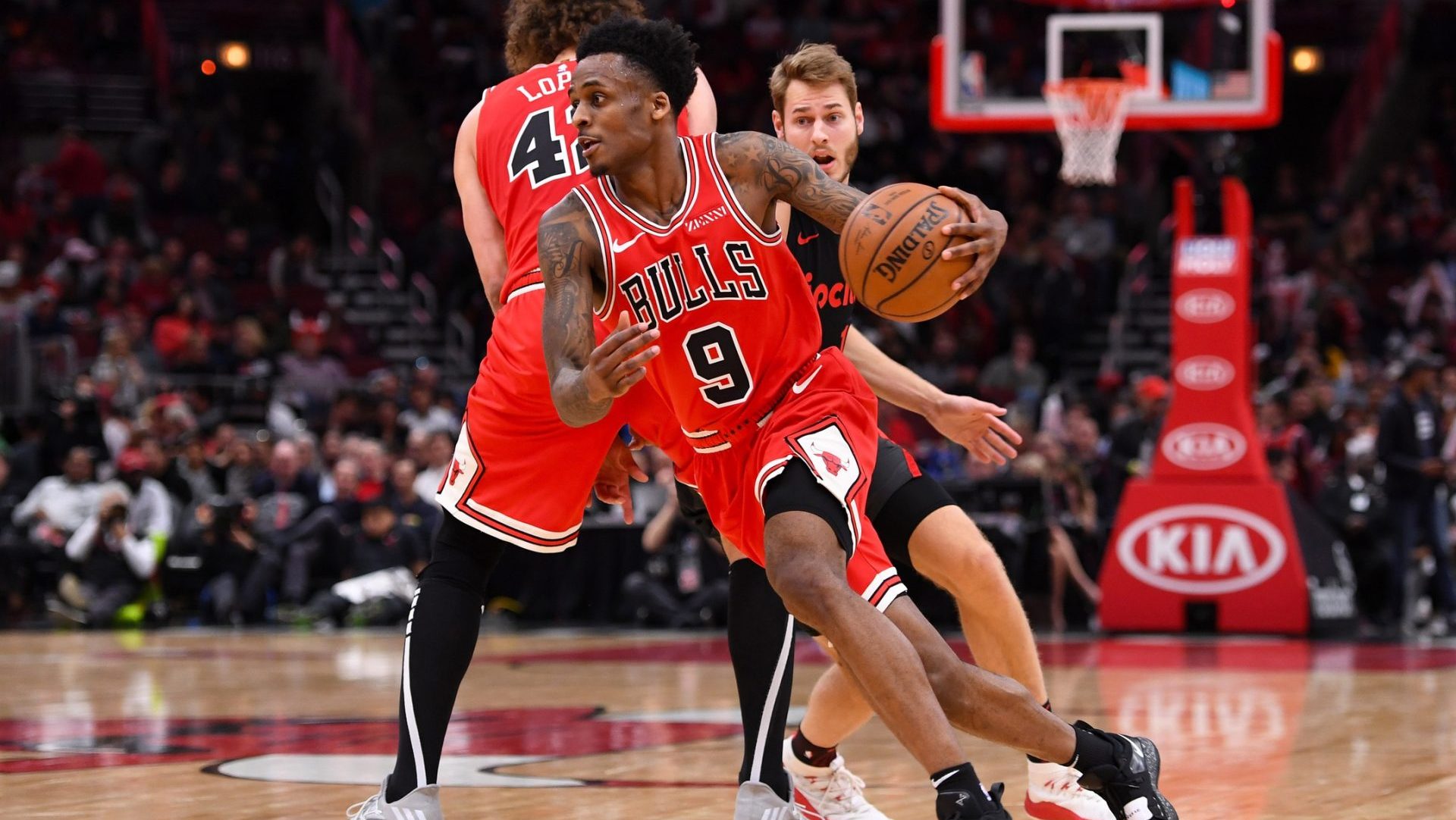 Mar 27, 2019; Chicago, IL, USA; Chicago Bulls guard Antonio Blakeney (9) dribbles the ball against the Portland Trail Blazers during the second half at the United Center.