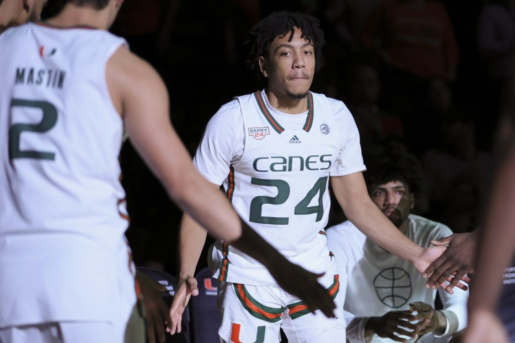 Dec 16, 2023; Coral Gables, Florida, USA; Miami Hurricanes guard Nijel Pack (24) is introduced prior to the game against La Salle Explorers at Watsco Center.