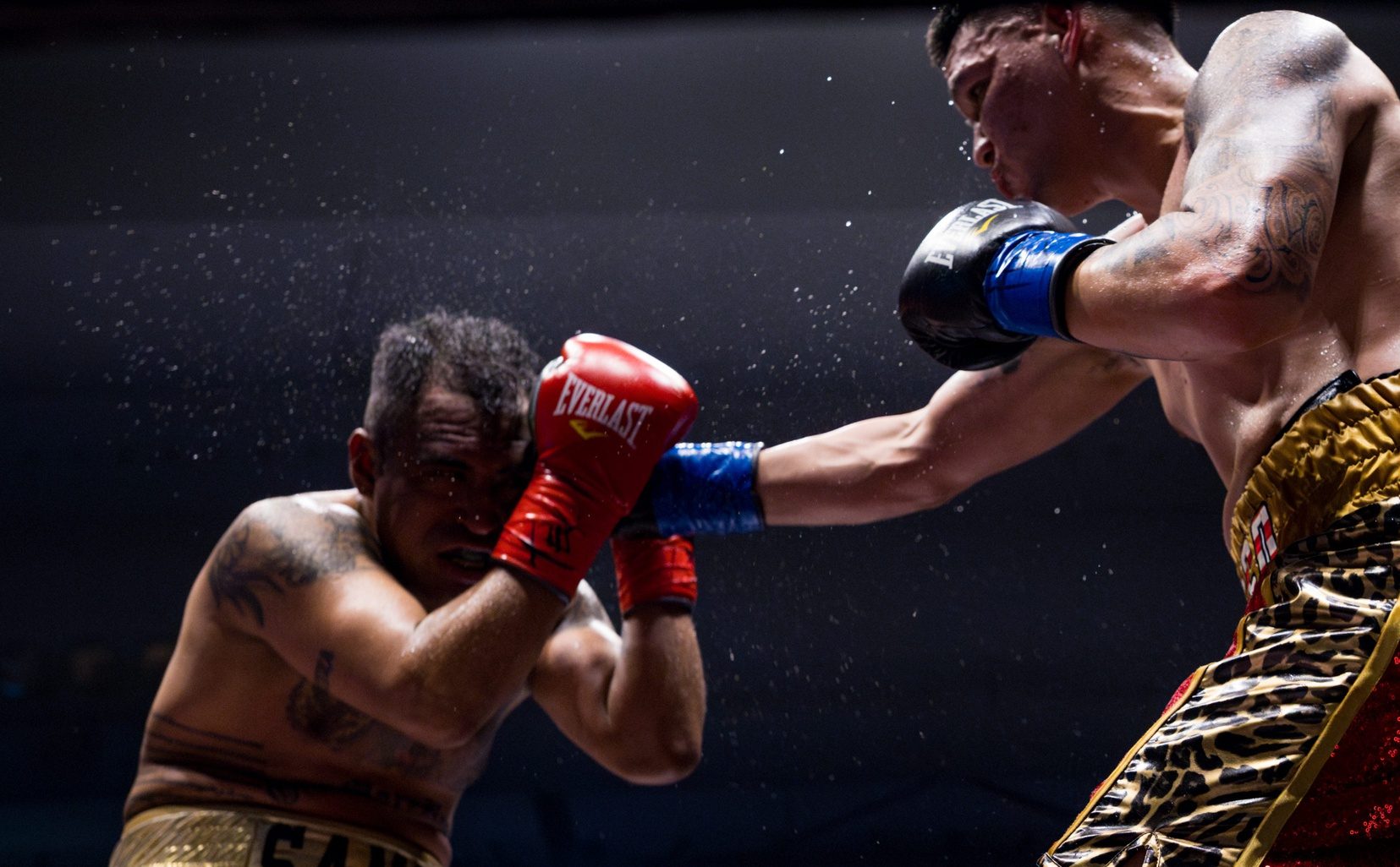 El Paso boxer Jorge Tovar, right, won by TKO at 1:15 of the fifth round against Mexican boxer Juan Francisco Lopez Barajas in the middleweight division of King’s Promotions Ring Wars XV boxing match on Saturday, Feb. 22, 2025, at the El Paso County Coliseum.