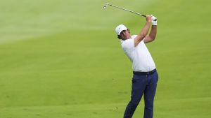 Aug 23, 2025; Detroit, Michigan, USA; Brooks Koepka of Smash GC plays his shot from the fairway on the sixth hole during the semifinals of the LIV Golf Michigan Team Championship at The Cardinal at Saint John's Resort.