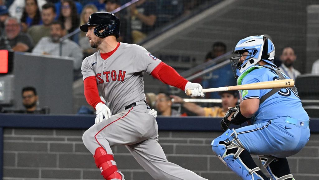Sep 24, 2025; Toronto, Ontario, CAN; Boston Red Sox third baseman Alex Bregman (2) hits a single against the Toronto Blue Jays in the first inning at Rogers Centre.