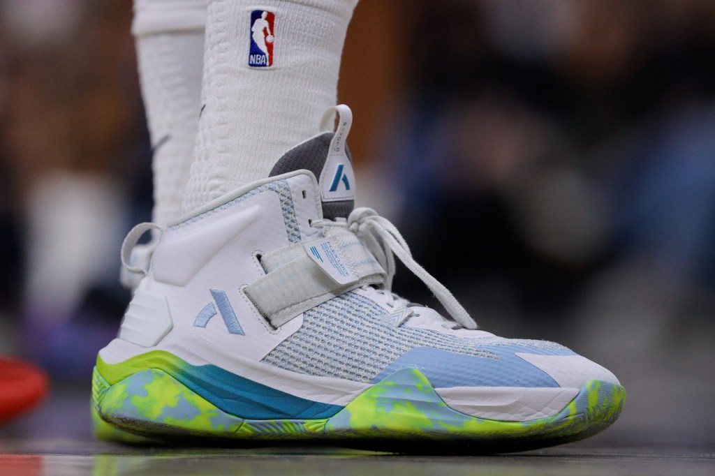 Dec 22, 2025; Denver, Colorado, USA; A detail view of the shoes worn by Denver Nuggets forward Spencer Jones (21) in the third quarter against the Utah Jazz at Ball Arena