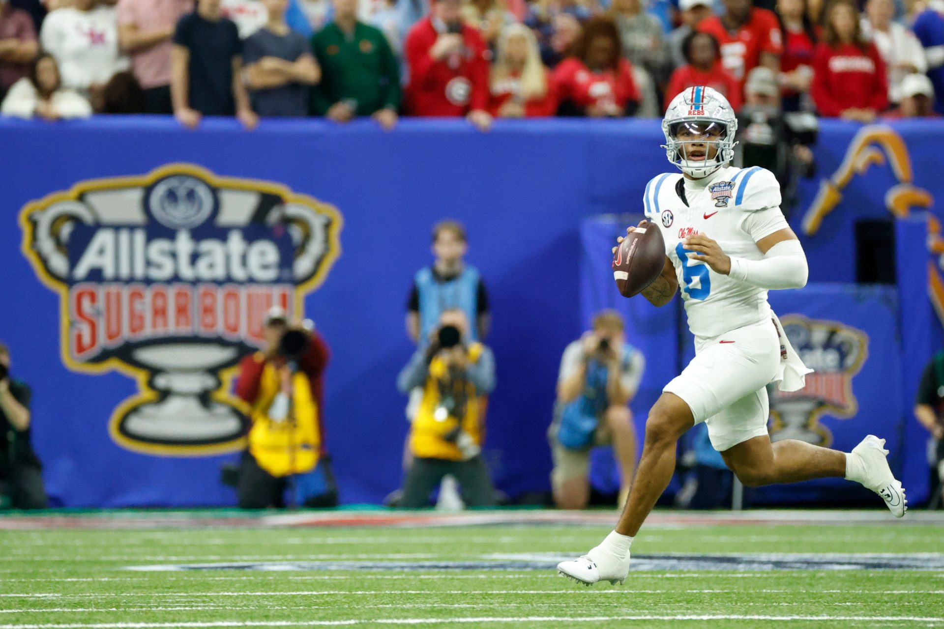 Jan 1, 2026; New Orleans, LA, USA; Mississippi Rebels quarterback Trinidad Chambliss (6) looks to pass the ball against the Georgia Bulldogs in the first quarter during the 2025 Sugar Bowl and quarterfinal game of the College Football Playoff at Caesars Superdome.