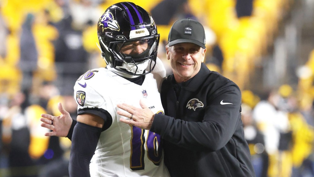 Jan 4, 2026; Pittsburgh, Pennsylvania, USA; Baltimore Ravens head coach John Harbaugh (right) greets wide receiver Tylan Wallace (16) before the game against the Pittsburgh Steelers at Acrisure Stadium.