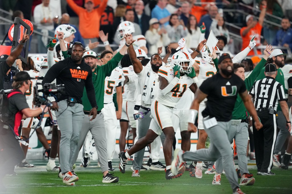Jan 8, 2026; Glendale, AZ, USA; The Miami Hurricanes react after the second half during the 2026 Fiesta Bowl and semifinal game of the College Football Playoff at State Farm Stadium. Mandatory Credit
